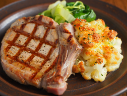 Grilled Pork Chop with Cauliflower Cheese